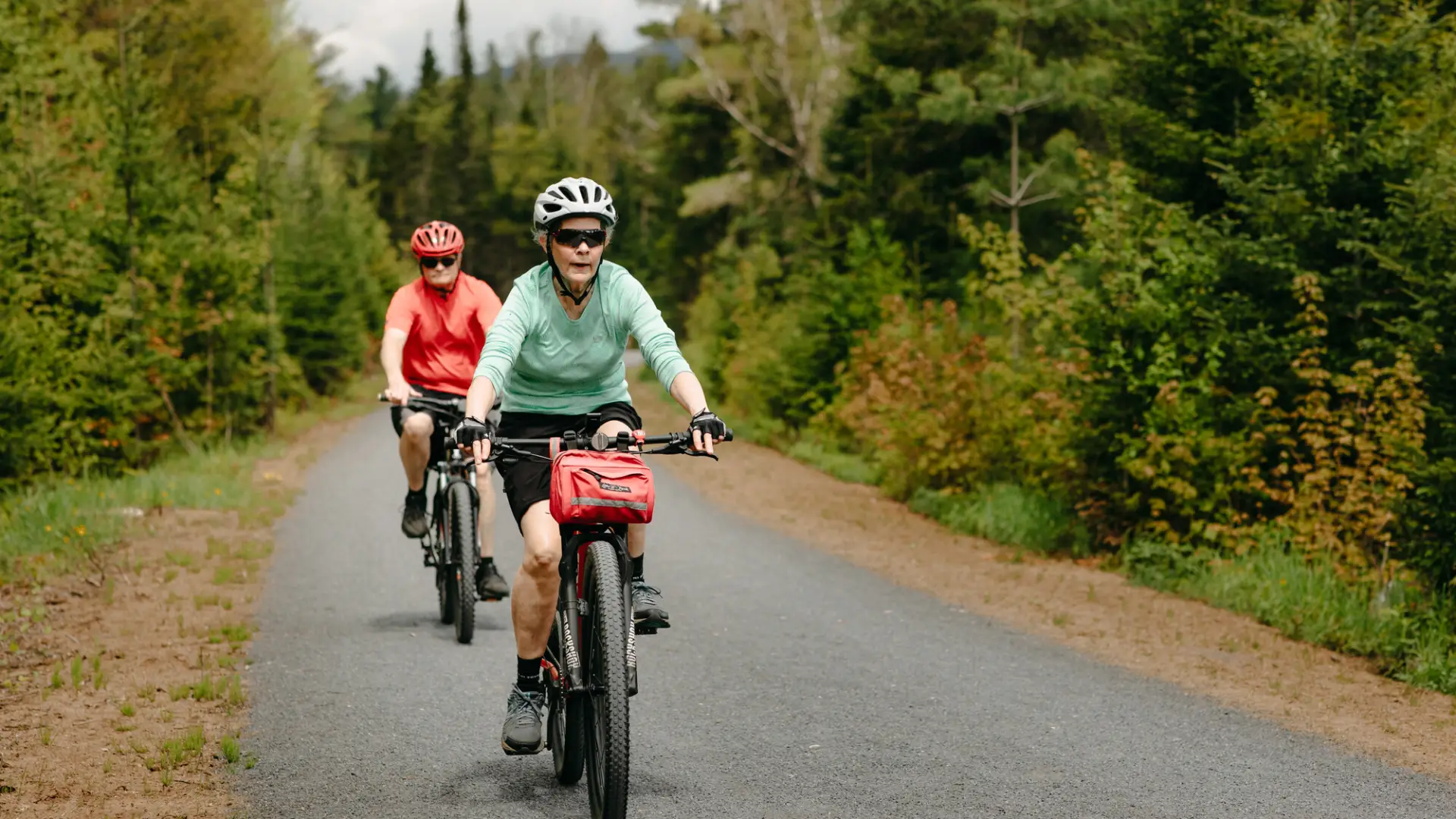 Two people riding bikes on Adirondack Rail Trail
